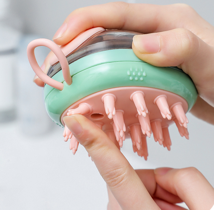 Bade- og massasjebørste med sjampodispenser